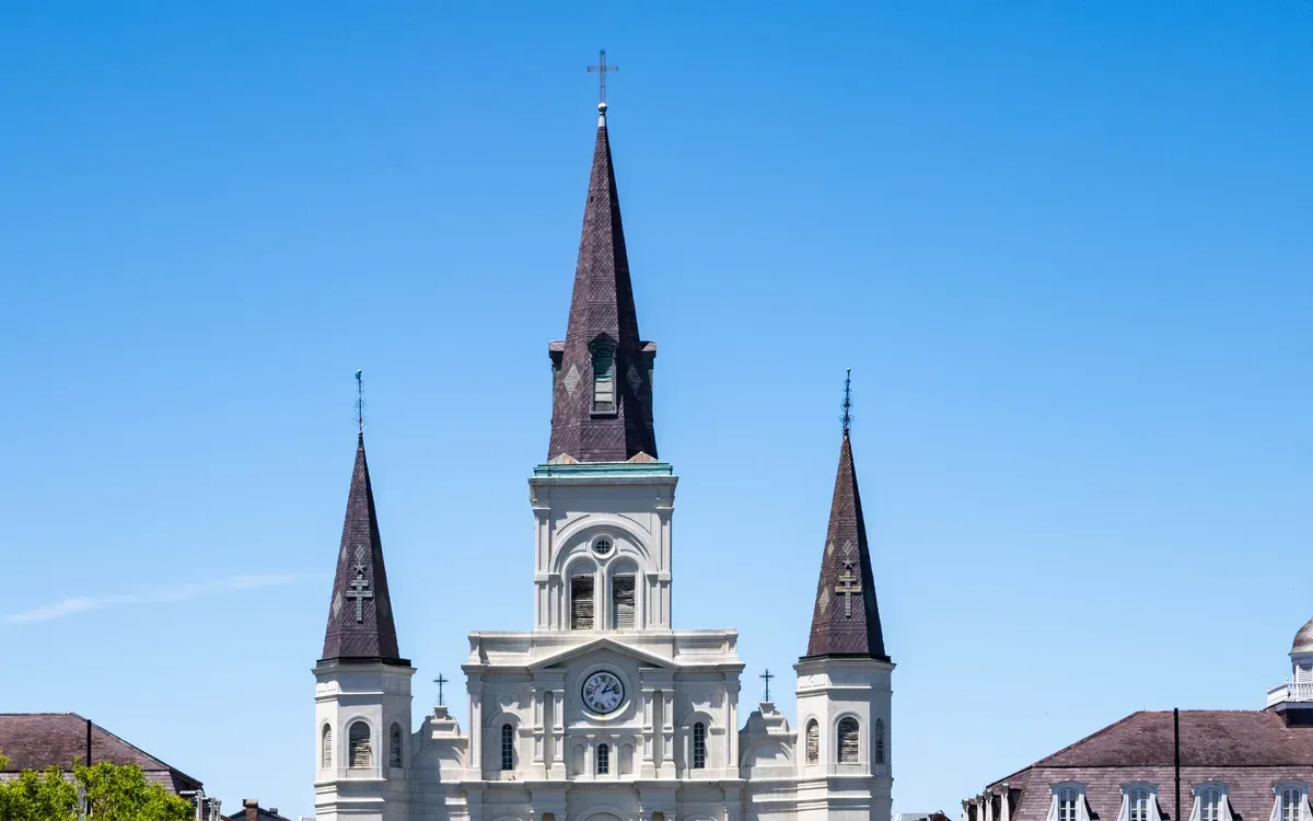 The spires of St. Louis Cathedral above Jackson Square in the French Quarter of New Orleans
