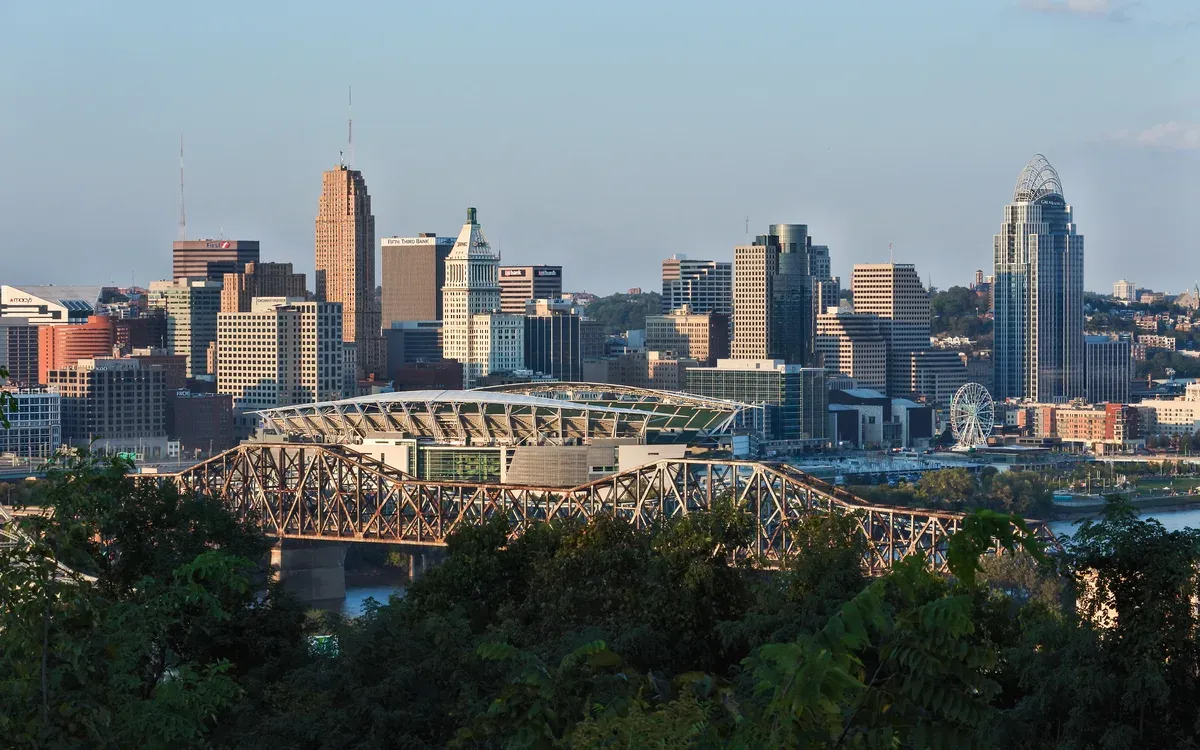 The downtown Cincinnati skyline and Ohio River bridges in golden-hour light