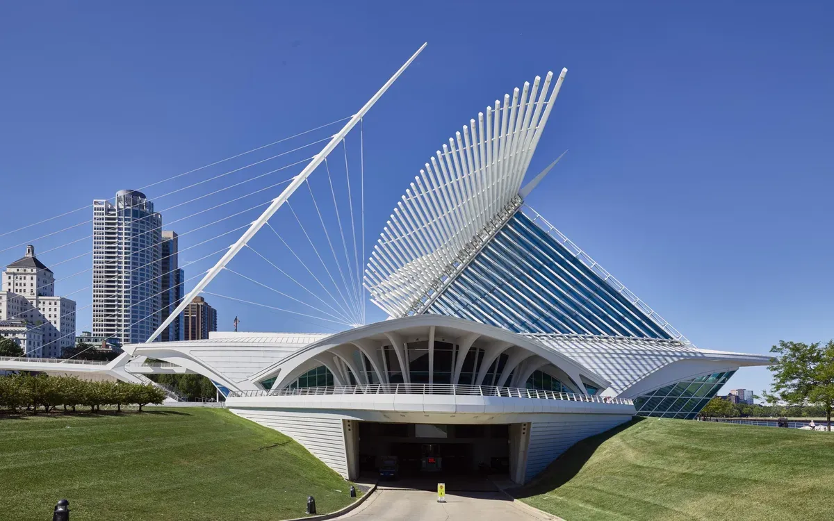 The Milwaukee Art Museum's winged Quadracci Pavilion against a deep blue sky