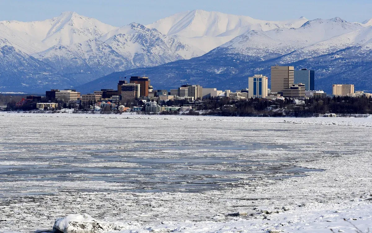 The Anchorage, Alaska skyline with the Chugach Mountains rising behind it