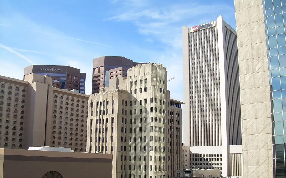 Downtown Phoenix, Arizona high-rise buildings, including the US Bank Center tower, under a clear blue sky