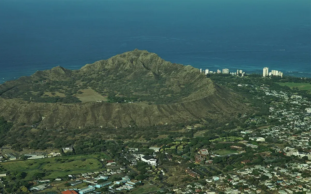 A clean daytime view of the Diamond Head crater and headland on Oahu