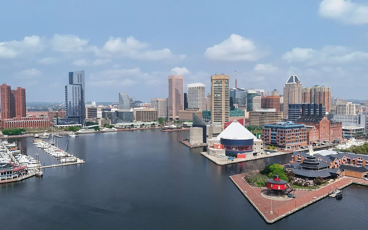 Baltimore's downtown skyline and Inner Harbor seen from the air on a sunny day