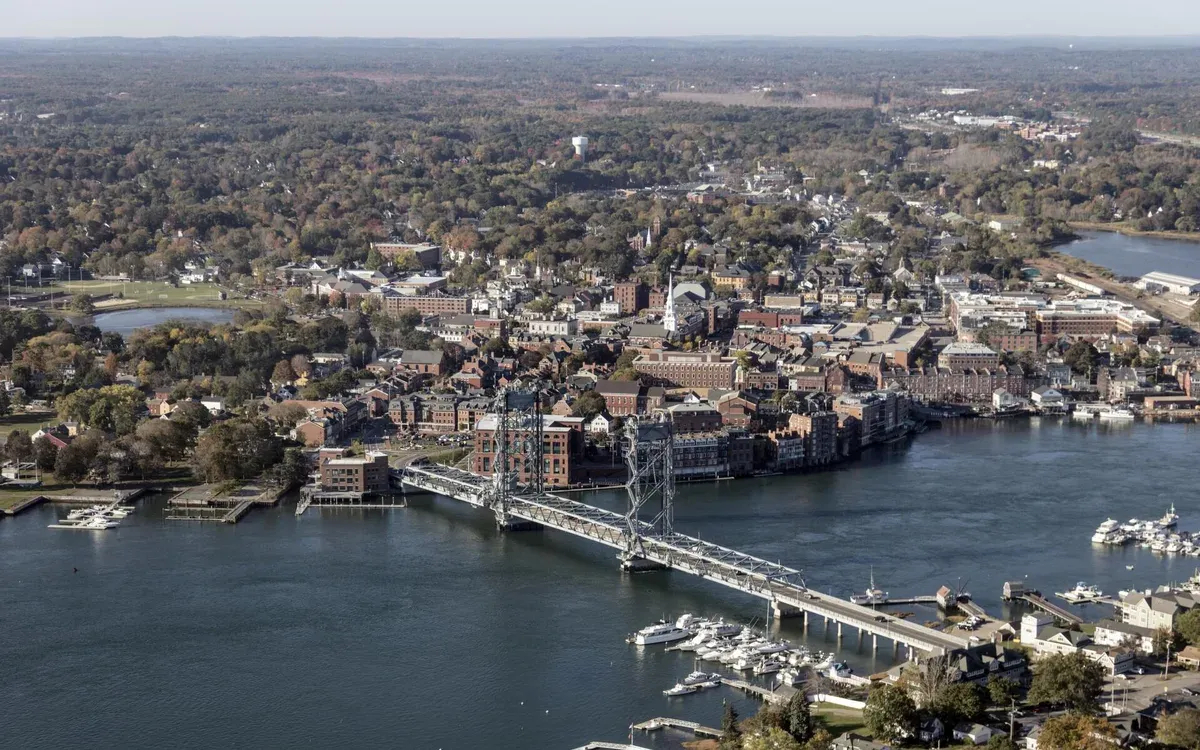 An aerial view of Portsmouth, New Hampshire, showing the Memorial Bridge crossing the Piscataqua River