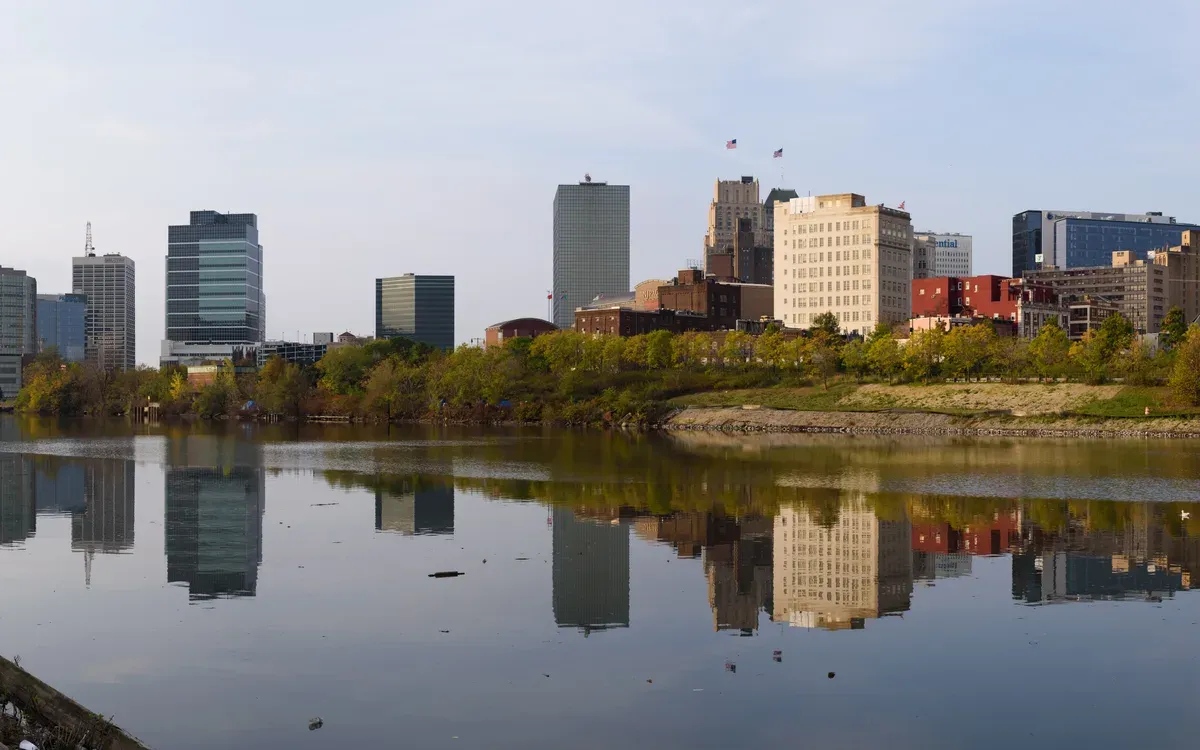 The Newark skyline mirrored in the Passaic River, seen from Harrison, New Jersey