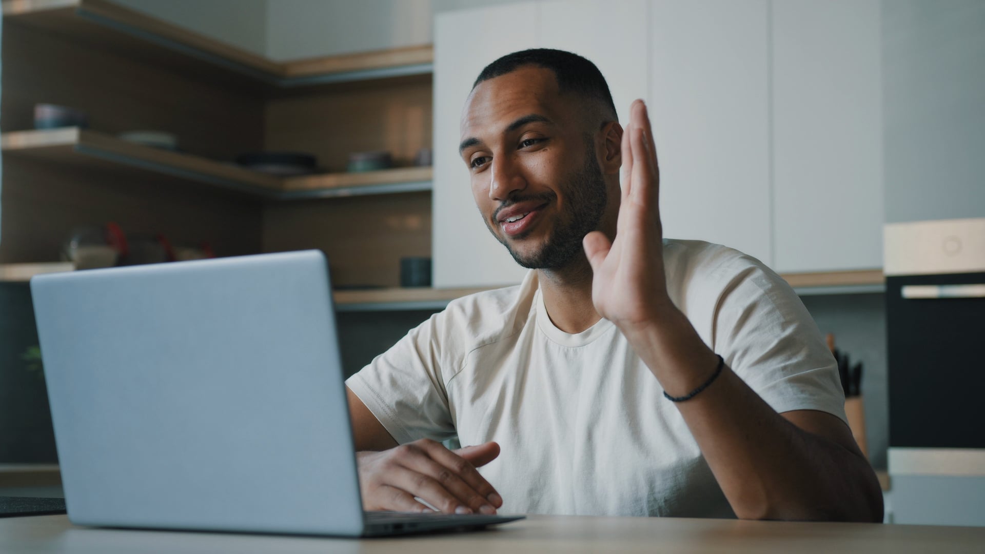 Illustrative scene of a learner at home greeting a live online class